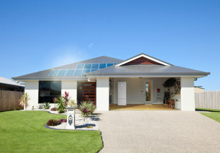Suburban family home with solar panels on roof